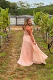I loved this dress. It was long as I'm on the shorter side. It fit nicely in the bust area. It was perfect for my winery bachelorette Party < - Jocelyn J.