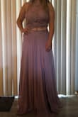 This dress is absolutely stunning! A little long but I am only 5 ft 2 so it is to be expected. The dress has such a beautiful color and design. It is worth every penny and I definitely recommend Lulus for anyone looking to get a gorgeous dress like this one! - Wendy V.