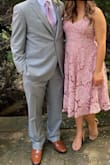 I wore this dress to a wedding and received soo many compliments! I was worried that it would be too long on me since I'm pretty short, but the length was alright. I would have preferred it a little shorter and less poofy (i.e., I could have done without the tulle), but overall I loved it and it photographed nicely.

Small chested ladies, note: This dress is a little large in the bust and had some gapping. Although the straps were adjustable, the fabric kept slipping every time I tried to tighten it. I tried to use fashion tape but it didn't keep the bust from gapping and exposing my bra. I still don't have any regrets, though. - Jessica T.
