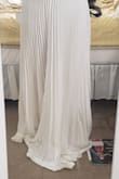 This dress has a lot more weight to it than you would think. It is definitely a contender to be worn on the big day! I am having a beach wedding. It is pretty long, so I would need to hem it and although the fabric is heavy, it is a bit sheer, so be careful with your undergarments! - Tiffany P.