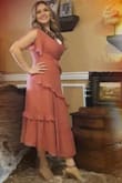 Looks great on my 47 y/o self. Got a lot of complements on the dress. Leg and sleeves openings are the icing on the cake. - Janette R.