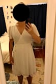 I got this dress initially for my minimony (2020 bride) but decided to save this for my bridal shower next year instead. It is a beautiful dress for the price! Very flowy and light which is just what I was looking for. It is a full wrap dress so I was able to adjust it to fit me perfectly. I will say that the fabric is a little shear, so it's noticeable where the layers  overlap and I will need to tack the front so it's not too open but overall a wonderful dress that I'm excited to wear! - Kate V.