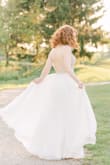I got this dress to wear to my rehearsal dinner, but when we postponed our wedding I ended up wearing it for an engagement photoshoot that day to honor our original date. My photographer couldn't stop telling me how much she loved my dress! I'm obsessed. I'd wear it every day if I could! Photos by Belinda Jean Photography LLC! - Courtney C.