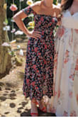 This dress was so flattering, and I got so many compliments. Even though it is strapless, the stretchiness of the top stays up just fine, and the little sleeves look so cute. I am about three months pregnant so it perfectly hid my tiny bump, and the length is perfect If you're on the short side. - Anna S.