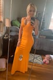 I bought this dress for a wedding this past weekend it was a hit. The color is bold and paired well with gold jewelry and camel-colored heels. It fit like a glove, and it required zero alterations. IN LOVE with this dress. - Daniella M.