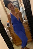 I wore this jumpsuit to a wedding and it was the perfect little outfit! The material is nice and thin and shows off just the right amount of skin. I had to twist the top ties though because they kept cupping at the sides and fit my bust a little weird. All in all it's suuuper cute and I 100% recommended it. - Zharelle