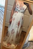 I bought this dress for my COVID elopement and was so disappointed at the size when I tried it on. It is very long, sits heavily on the floor even with heels. There's also a ton of fabric so aside from the cinch from the wrap in the middle, there's no shape. It would have nearly doubled the cost of the dress to have it tailored. The straps are adjustable though which is nice and helps with the size and the wrap works nice to tighten it. The fabric and design are beautiful. - Taryn H.