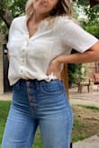 Cute and comfy top, good blouse for hot days. Could size down if you want, I am between small and medium and I am glad I got the small. - Margaret W.