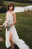 I bought this dress for a makeshift picture idea for my sick father and I. He won't be at my wedding one day, because he is sick. I surprised him with wedding first look pictures. This dress was magnificent for this!!! I just loved it! It was more than I could've hoped for! - Katie B.
