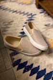These shoes are super cute. They're a fun sparkly champagne color. I ordered my standard size and my toes are hitting the front of the shoe. I'm going to exchange them for a larger size. - Katie W.