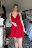 I got this as a prom dress option. The material the dress is made out of is super heavy. other than that the back is super cute - Grace R.