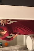 I purchased the berry red and the color is true to the picture as is the style. It is a thin material (not necessarily see through) that wrinkles easily. The sleeves are 3/4 and the tie does like to twist up. I am a size 4 and usually wear a small but after reading reviews decided to order a medium. The medium fits perfectly so I would say this dress runs a size small. This dress does not hide your curves but accentuates them and will show underwear lines. I purchased this dress because it truly is a nice dress for the price. I hope this review helps future shoppers! - Meghan S.