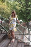 I wore this dress on a trip to the Canal Saint Martin in Paris, France,  in August. The cut is great, you just need a discreet pin to secure the neckline a little. Great idea to line the back of the skirt with light soft fabric so it's not transparent in the sunlight, very clever! The fabric is light and fresh and the lemon design amazing. I took a medium and it has a nice swing to the skirt and is perfect for a Summer's day. Definitely my favorite dress this year! - Clare R.