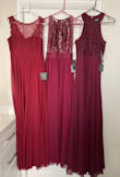 Very pretty but I wasn't able to zip up the back. It has a sheer fabric on the sides down to the waist. I bought 3 other dresses from here all listed as burgundy and they were all different colors. This one (middle) is more of a maroon. - Sue C.