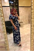Bought a size up just because the sizing is so hit or miss on this site. But I couldn't be happier with it. It's a bit long, even for someone like me who is just over 5'9", but paired with platform shoes, it was perfect. Purchased this for my birthday this year and got so many compliments on it! I need one in every color! - Callie C.