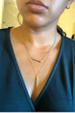 In the photo online, it looks like the 2 layers of the necklace are different lengths (one is short and one is long)... but that's not the case. Really there's only about an inch difference, and it does't look right. - Amanda Q.