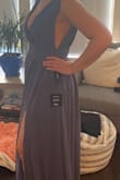 I love this gown in the denim blue, I picked it out for one of my dresses for our engagement photos. I do have to get it altered on the bottom, and the straps tightened a little cuz I'm losing weight, but overall it's flattering for pictures. - Alicia L.