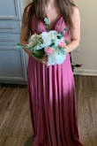 I picked this dress for my bridesmaids because they could style the dress in so many different ways. The color of this dress is definitely different from some of the photos from other customers. I'm pretty sure it was a filter that they might have used so keep that in mind. Much darker than my original plan but we can work with it. - Elena R.