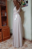 It fits perfect! The fabric, color and size was awesome. I loved that it is a long dress because I can use it with high heels. I dont have a large bust, so it was just a little loose just in that part, but other than that it was amazing. No regrets. - Sossy V.