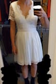 XS fit for my height and weight. Good for my very casual wedding - Sarah G.