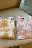 The top and bottom are cute and soft; they just don't match. The colors of the tie-dye are off. One has pinkish the other more brownish. Wanted to love it, but now stuck with two pieces that can't be worn together. - Jamie T.