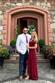 This was a great choice for a summer wedding at a castle. Classy and elegant. Aside from accidentally matching the wedding party colors, it was perfect. I ordered an xs due to other reviews and I wanted a more fitted look. It was a bit tight but I am glad I went with the xs. The top was a bit loose and my bra would occasionally show through the button. Nothing a little fashion tape couldn't fix. I felt beautiful and comfortable. - Sabrina S.