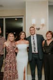 I had to get alterations because it was too long. Other than that, it was perfect. I wore it to our engagement party. Great thick material! - Alyssa M.
