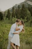 I LOVED this dress! I wore it for my engagements and it was PERFECT. Because it's a wrap dress it fits SO WELL. It was a good material that didn't look wrinkled at all. It was just perfect! - Camryn S.