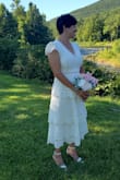 I'm wearing this for my elopement wedding in August 2020. I had ordered a size large and the medium the medium fits perfectly.  I'm able to wear a regular bra with the dress. It hits me about mid calf. Dress is lined except the little strip around waist but it just breaks up the dress and adds a nice touch. Eyelet material is beautiful. - ToniAnn D.