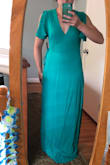 This dress is gorgeous and the quality is very good! I ordered these as all of my bridesmaids dresses and am very excited about them. They flatter every body type. A few of my girls were debating between two different sizes - the smaller of the two ended up working in every case, this is a true wrap dress with a lot of fabric to work with! The slit is not nearly as pronounced in person as it is on the model, so it is not overly revealing which I liked. Don't hesitate, buy them! - Andrea