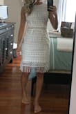 I loved this dress when I tried it on way more than I thought I would. The material is a little thin, doesn't feel very durable but it's super cute and sassy with the fringe and cut outs. Great length and overall true to size fit! - Jess C.