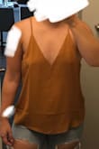 The shirt fits me a little funny. I order a M usually, but I felt that this was just too loose. I think if the straps were adjustable, I would definitely be able to make it work! - Allie D.