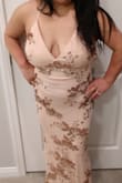 This dress is absolutely gorgeous. Very high quality. Bought it for my fiance. She loves it and so do I. She has a big bust, so had to go a little larger in size. And will therefore have to take the dress up given she's petite (4'8"). - Alan M.