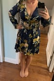 The satin material makes this dress very lightweight. I did not end up wearing the dress because the sleeves were a little snug when I bent my arms because the material is not forgiving at all. Overall, the color is beautiful on, and I will be wearing to a future wedding. - Samanth L.