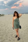 The romper is gorgeous, super stretchy, form fitting, and frames my pear shaped body so well! The color is also very pretty and unique in person. Almost like a light teal-olive. The only reason I don't give it a full 5 stars is because it seemed to get lint balls the first wear even the fabric didn't really touch anything rough for those to form. - Natalia Z.