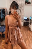 It's super cute. It fits beautifully. It hugs in the right spot so that it gives the illusion that I have a tiny waist and big hips lol. Super comfy and flowy. I love it sooo much!! - Marielle A.