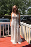 Like other brides our wedding plans changed and we are now planning a micro wedding on a mountain. As soon as I saw this dress I knew it was perfect. Unfortunately it was already sold out in every size so I checked back every single day and ended up buying an M and L. Typically I'm an M in all of Lulus dresses but the L just fit a tiny bit better. The straps on the M were a bit too tight and I liked the deep V of the L better. There was very little difference in the waist size of the M and L. It is a bit see through but it's so sexy and PERFECT. The slit is only obvious if you pull the dress open. I seriously can't wait to wear this for our wedding. - Charlotte W.