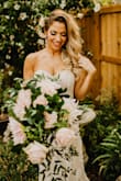 Loved it! No one could believe I got this from Lulus! I wanted to save my real wedding dress for our big ceremony next year which we postponed due to Covid. My husband and I wanted to still tie the knot so we had a minimony in my sis in laws yard. The dress was beautiful and I felt amazing! - Alyssa C.