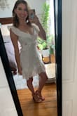 I love the look of this dress and that the cutout is a little sassy without being over the top. I wore it for my bridal shower and loved the unique take on a little white dress. Do want to call out that you need a bra thats a bit more low cut to accommodate the neckline. I kept needing to adjust to prevent it from popping out just because I didnt have the best style bra. - Tori U.