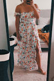 I love the fit and feel of this dress. The side cutouts give it more interest and break up the busy pattern a little bit. Fits perfect and I love the high slit in the front. - Rachel B.