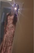 Very beautiful dress! I bought it for my elopement wedding. Loved the fit, the feel & the look. The silhouette of the dress gives your body a nice shape. Overall 5 stars - Kanchan D.