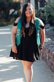 I wore this for my graduation picture session and my only complaint is that the shoulder straps were a little too far so I had to keep shortening them as they tend to slip. Throw on some cute heels and you'll look like a million bucks! - Nancy P.