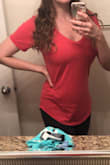 This is the basic t-shirt I have been looking for!!! After reading the reviews I gave this shirt a shot and I am so happy I did. Fits perfectly, not too snug or loose and has a very feminine look. I was happily surprised to find it is a thicker material than expected, so bras don't show through. It is a little more expensive than what I'd normally spend on a shirt, but it is well worth the cost. I cannot wait to order more! - Elise C.