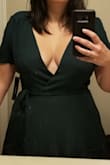 I ordered a medium despite my measurements for 2 reasons...
1. Last time I ordered some dresses from Lulu's I sized down and they were still a little large for me and had to return... and
2. They had no size large, I decided that maybe I should get medium anyway and did.
Some of the reviews also made me feel like medium would be fine.
So it fits... possibly a little shy of where the end is supposed to hit on the waist tie, but the real issue is the chest area... To be fair many reviews described exactly the issue I have but I guess it was wishful thinking! Its gapes open no matter how tight I tie it. Initially I thought I'll just return, and there are no more in any color so this would have to be it if I want this dress. At this point my heart was kind of set on it since my other options were not anything I was in love with so I tried it on again and decided maybe I'll sew some snaps in, but I'm still debating. Will wait and see if I can find anything at a store.
**please excuse the filthy mirror in my photo! - JUDITH E.