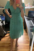 Really like this dress, color pattern and fit are great. Get lots of compliments on it. It can look a bit little-house-on-the-prairie when standing imo, but when you sit, the leg slit is very flattering. It does run large, I ordered a XS even though typically I am between a small and medium. It fit well; a bit snug on the tummy, but can be loosened with the string. If I had gone bigger, it would have been too loose on the bust (my small busted gals know the struggle!) This dress fabric is super light and fragile, and there has been some fraying on the ties on the arms and wrap part of the dress, and some loose threads on the inside of the dress. This could be fixed with some seams if you know how to sew, but I'm a little disappointed in the quality control on this dress. All other Lulus items of mine have been super high quality. I hope this dress holds up because I love how it looks. Also, I have been washing it on delicate and hanging to dry... putting this in the dryer would probably ruin it. - Kyla C.