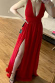 Fits true to size. Beautiful color. A tad long. I'm 5'4", and in 3" heels and I still had a couple inches of dress on the ground, but very good material & comfortable. - Heather M.