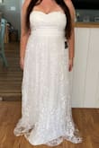 Zipped up perfectly and fit like a glove! Such a beautiful dress and can't wait to wear it for my backyard wedding!!! - Kelly T.