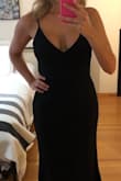 I absolutely love the fit and style of this dress. I bought it for my wedding ceremony and loved it so much that I bought it in black as well. I do recommend a minor alteration to the straps - since they are adjustable and I think that looks cheap. I altered my wedding dress to make the straps one size and also took the back to a "V" which turned out perfectly. I intend to make the same adjustment to the straps on the black dress. The material is a perfect weight and is stretchy. I just know that the black dress will be something that I can wear to different events in the future and won't go out of style because of the classic look and fit! - Nikki A.