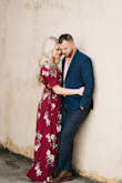 This dress is so flattering and beyond gorgeous! I wore it for my engagement pictures and it photographed SO well! I'm 5'8" and wore a small. Normally I don't like traditional "wrap" dresses because they never seem to be cut correctly, but this one is perfect! If you are bustier I would size up, I'm a 34B and would say it was just right, but could see how it may be a little revealing + not as stable in the front for someone bustier. - Maria E.
