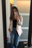 I loved this blazer and got so many compliments. It's very light weight, and fits just right. It's not stretchy and I might suggest ordering a size up from your normal size. - Cameron B.